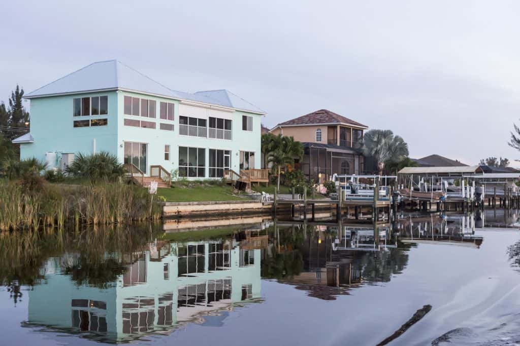 A peaceful canal flanked by the colorful homes of Cape Coral.