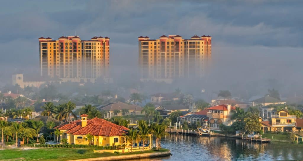 A fog rolls over the shops at Cape Harbour in Cape Coral Florida.