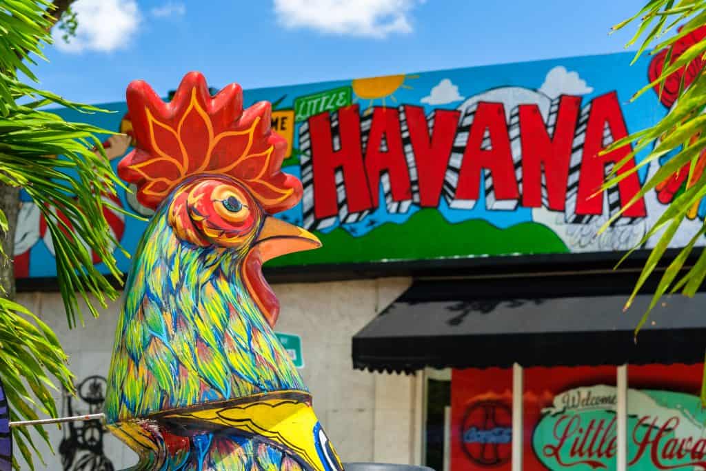 A bright mural and painted chicken sits in Little Havana in Miami, Florida.