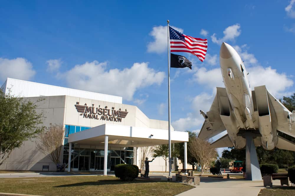 The outside of the Naval Aviation Museum featuring a plane.