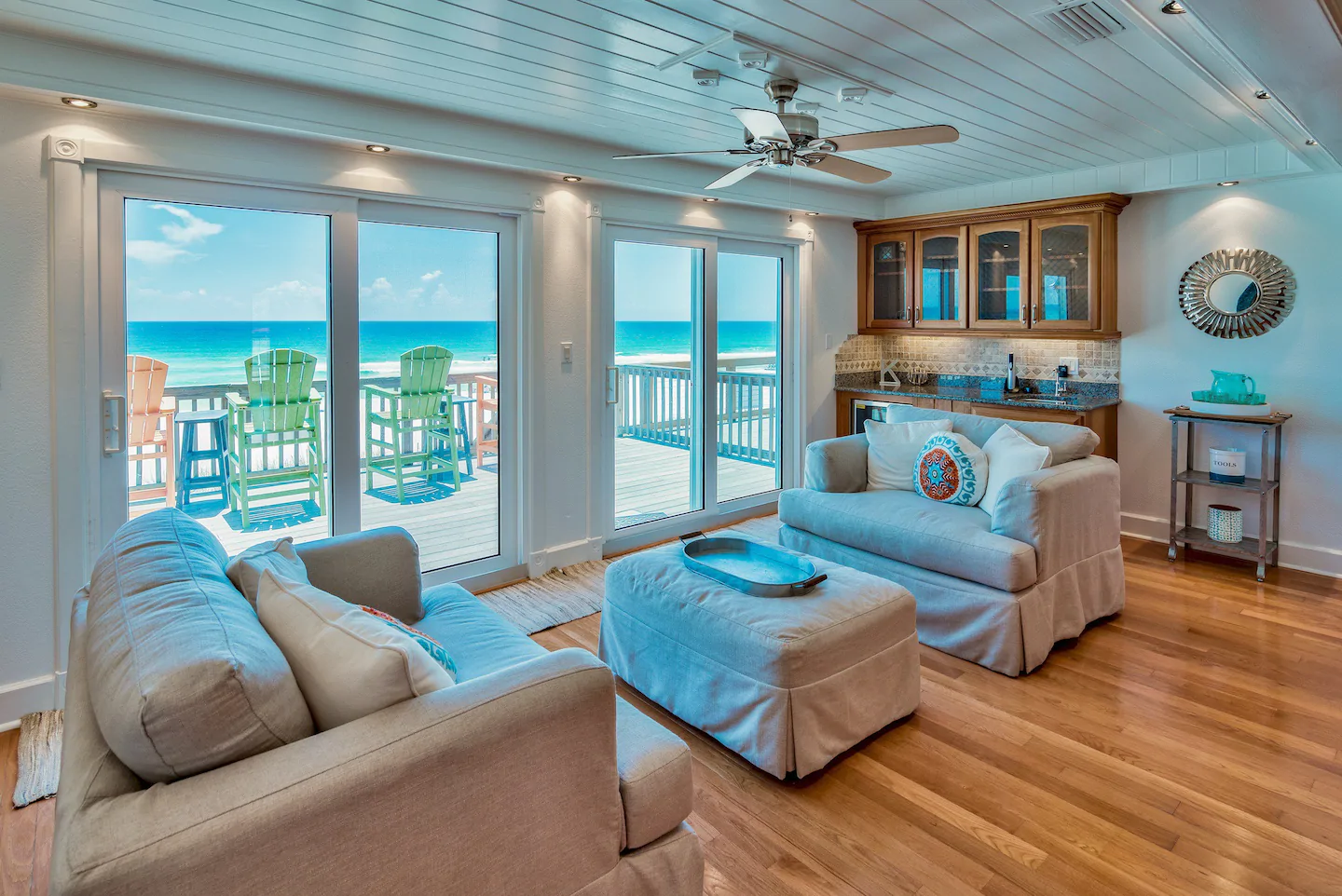 Photo of the living room and balcony in a beachfront Airbnb in Destin.