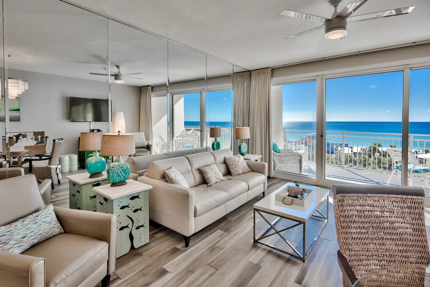Photo of the living room and ocean-front balcony at one of the best Airbnbs in Destin.