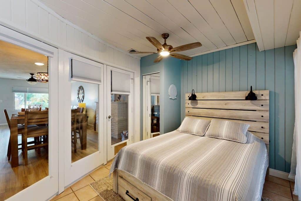 Photo of a coastal chic bedroom inside an Airbnb in Sarasota.