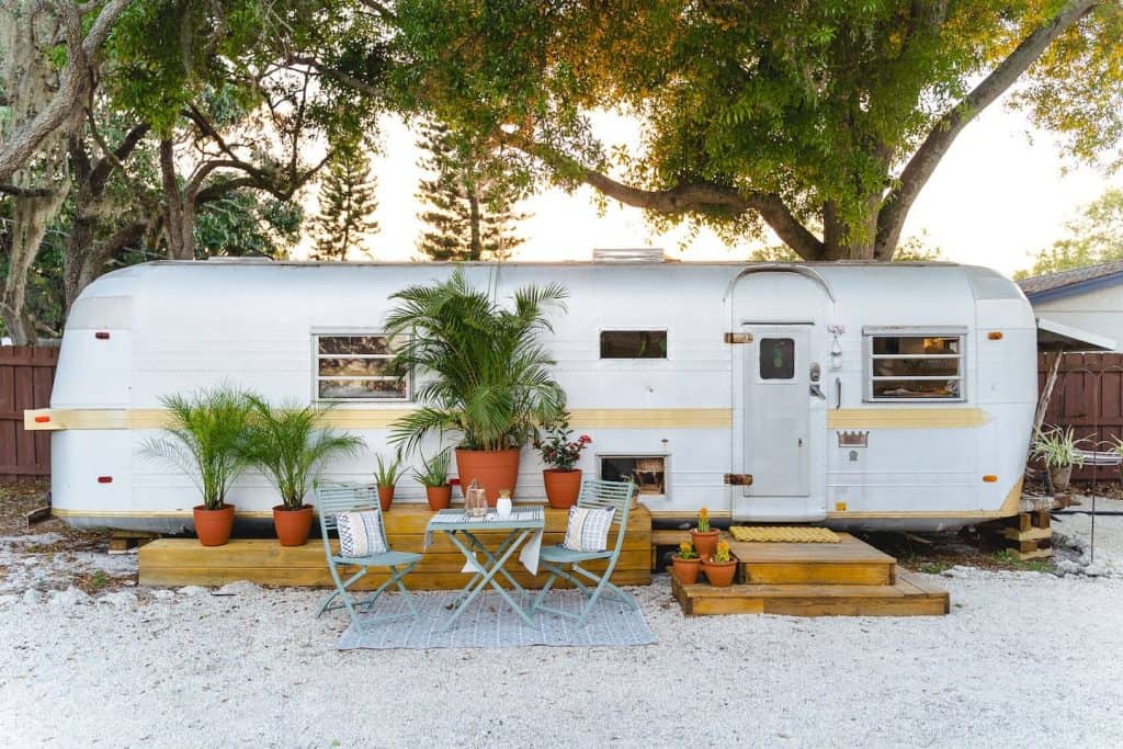 Photo of the exterior of a vintage 71' Airstream Airbnb. 