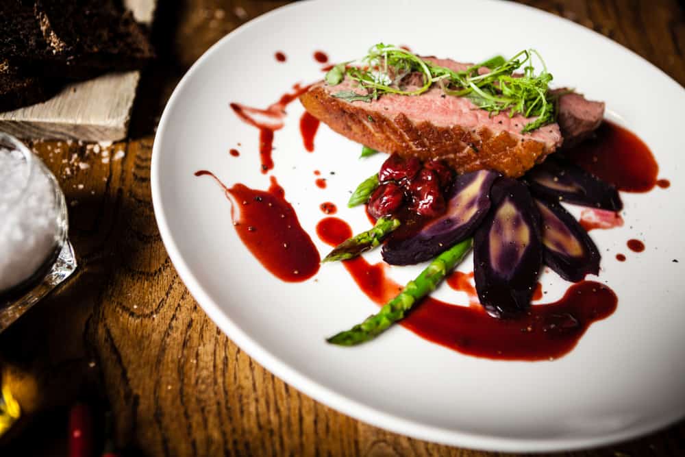 Plate of Maple Leaf Farm Duck Breast at Collage Restaurant in Saint Augustine