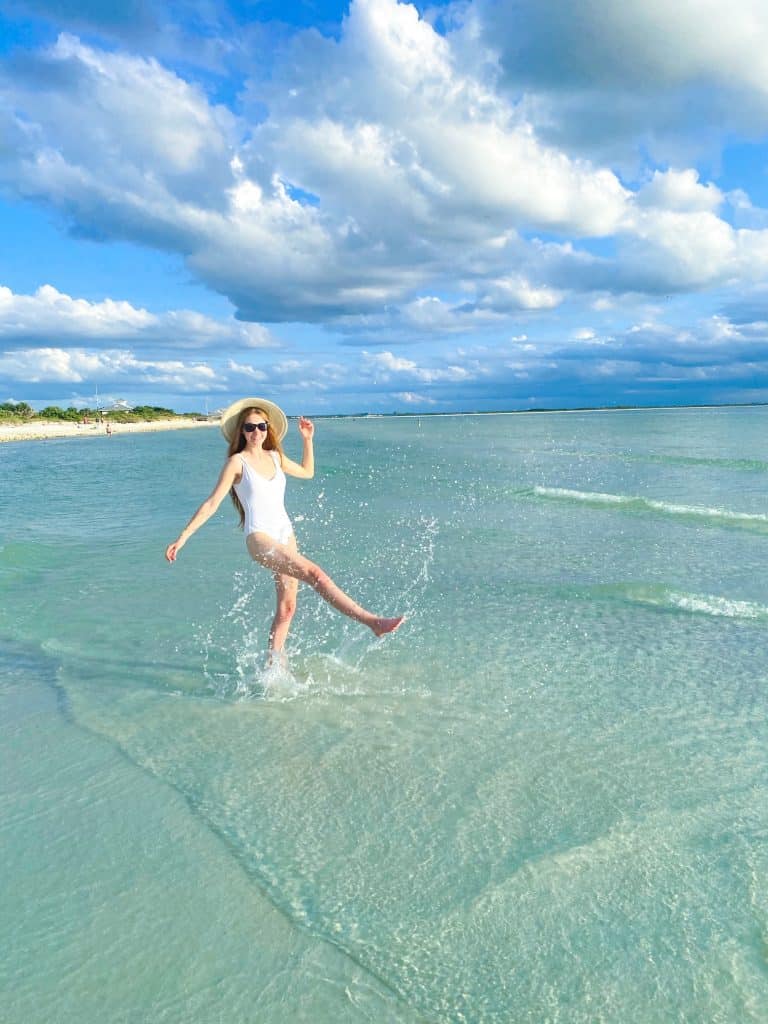 splashing in the water at honeymoon Island State park