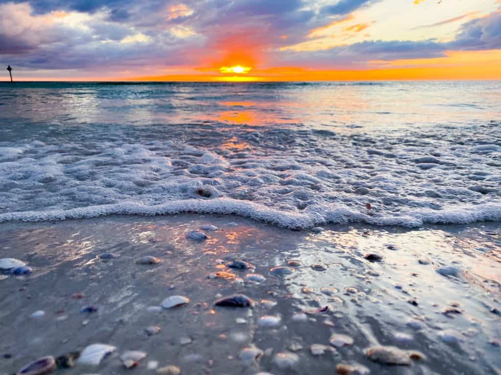 sunset along the water at honeymoon Island