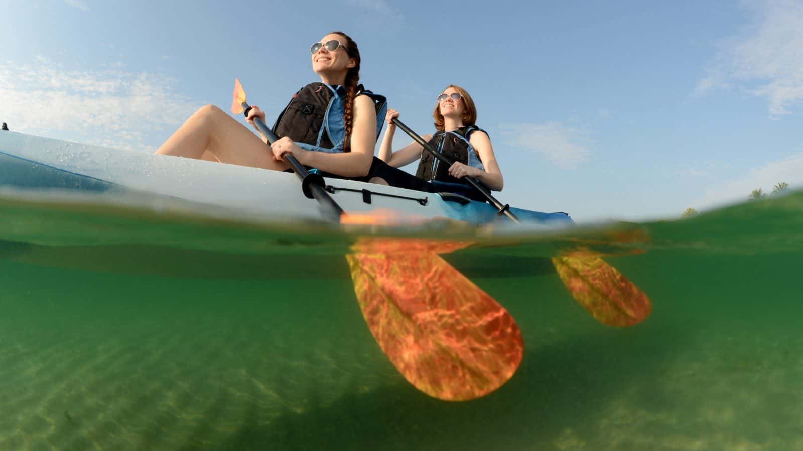 A tandem kayak paddles through Florida waters.