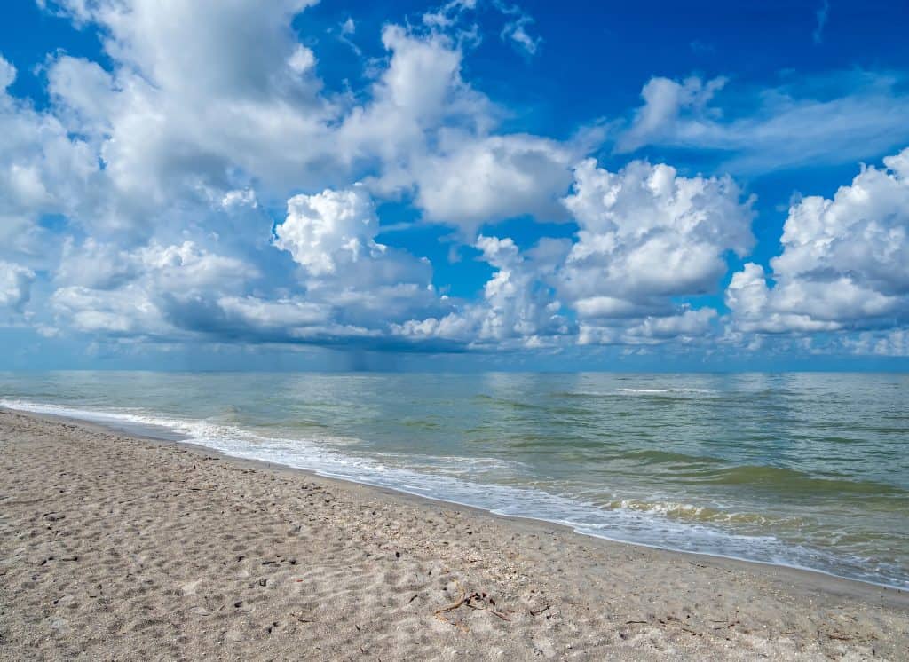 The waters cascade gently on the shore of Turner Beach, aka Blind Pass Beach.