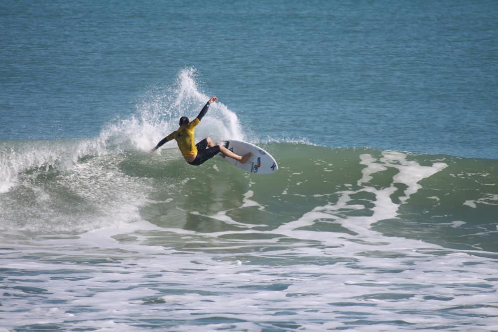 A male surfing in Florida
