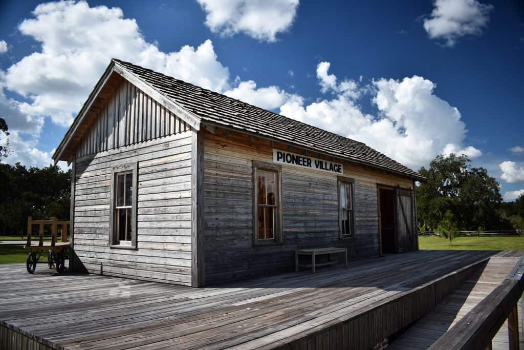 A relocated, wooden building marks the Pioneer Village, one of the most interesting things to do in Kissimmee. 