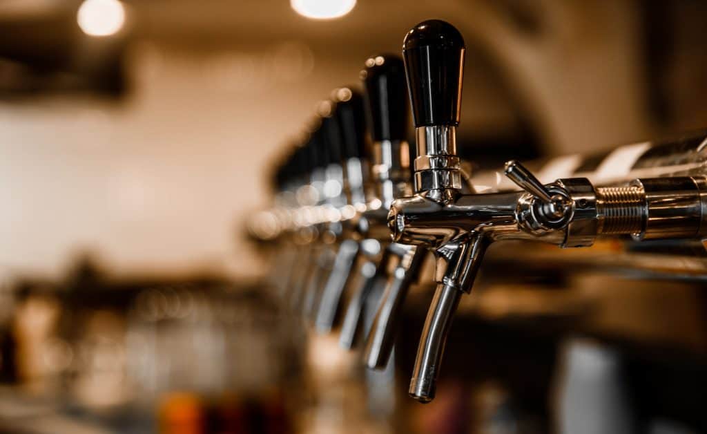 A line of taps wait to be poured like those at Marco Island Brewery, one of the best things to do in Marco Island.