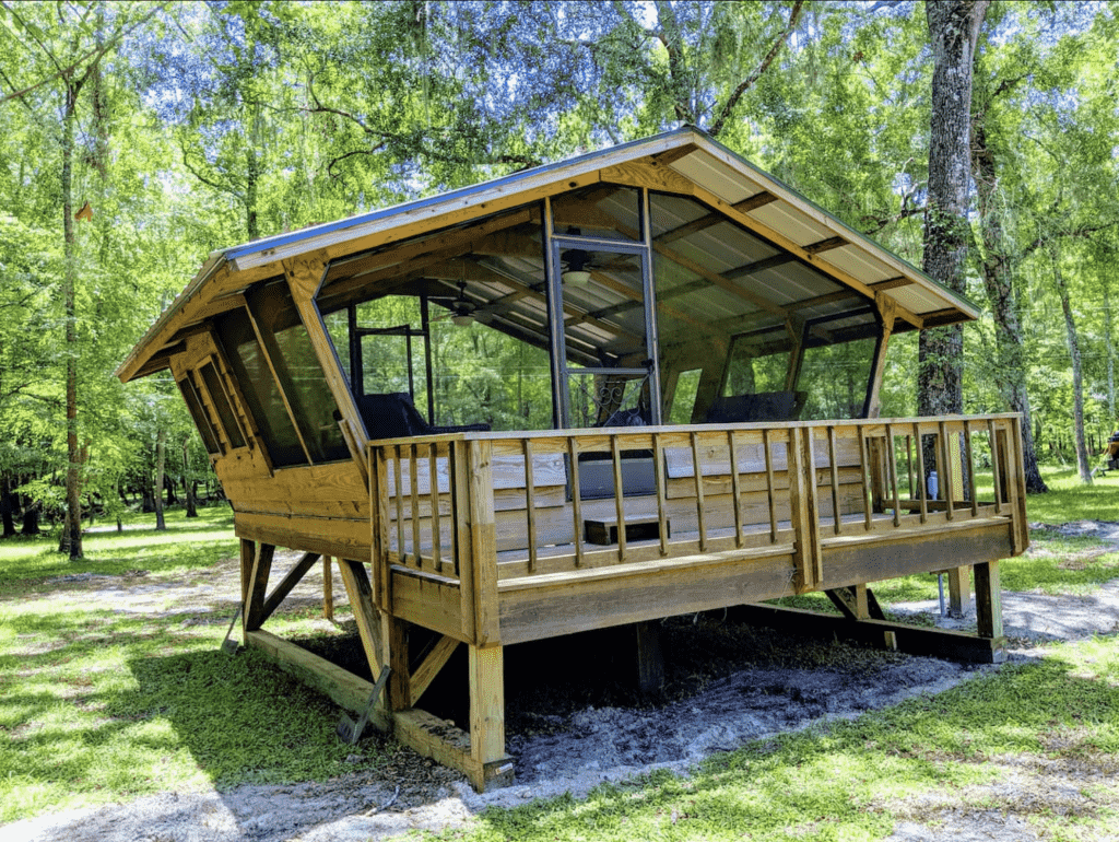 The Birdhouse sits on the Suwannee River, one of the best treehouse airbnbs in Florida.