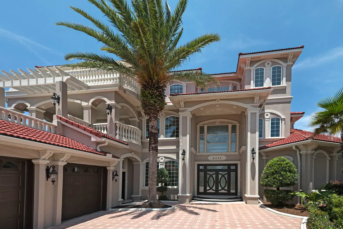 Photo of the exterior of a Destin Beach Mini-Manison Airbnb property.