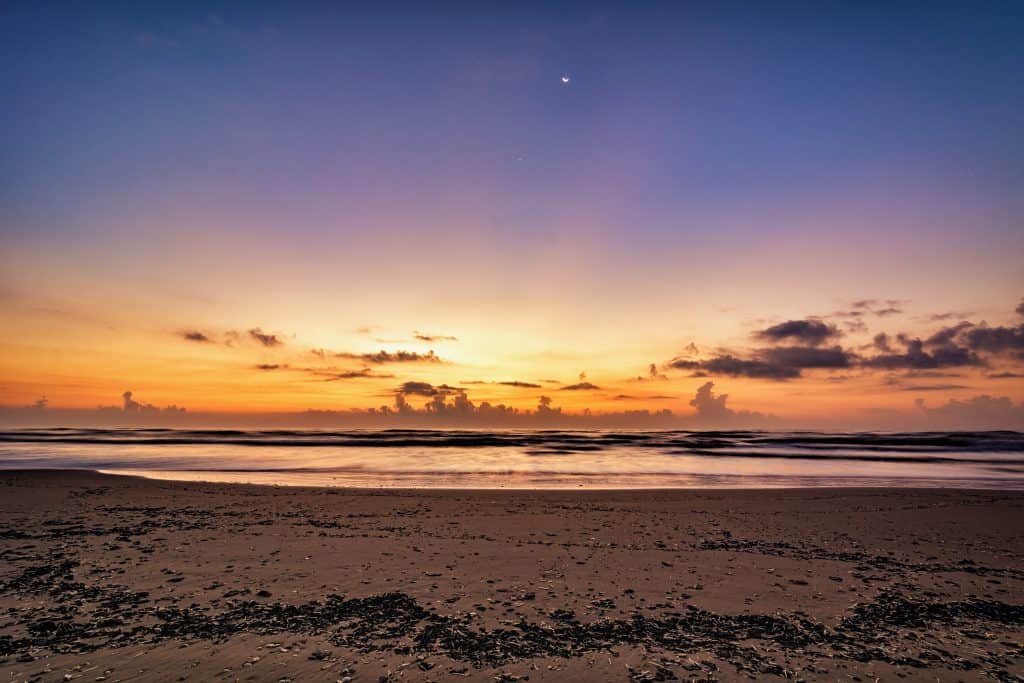 The sands of Boca Chica Beach edge into the water.