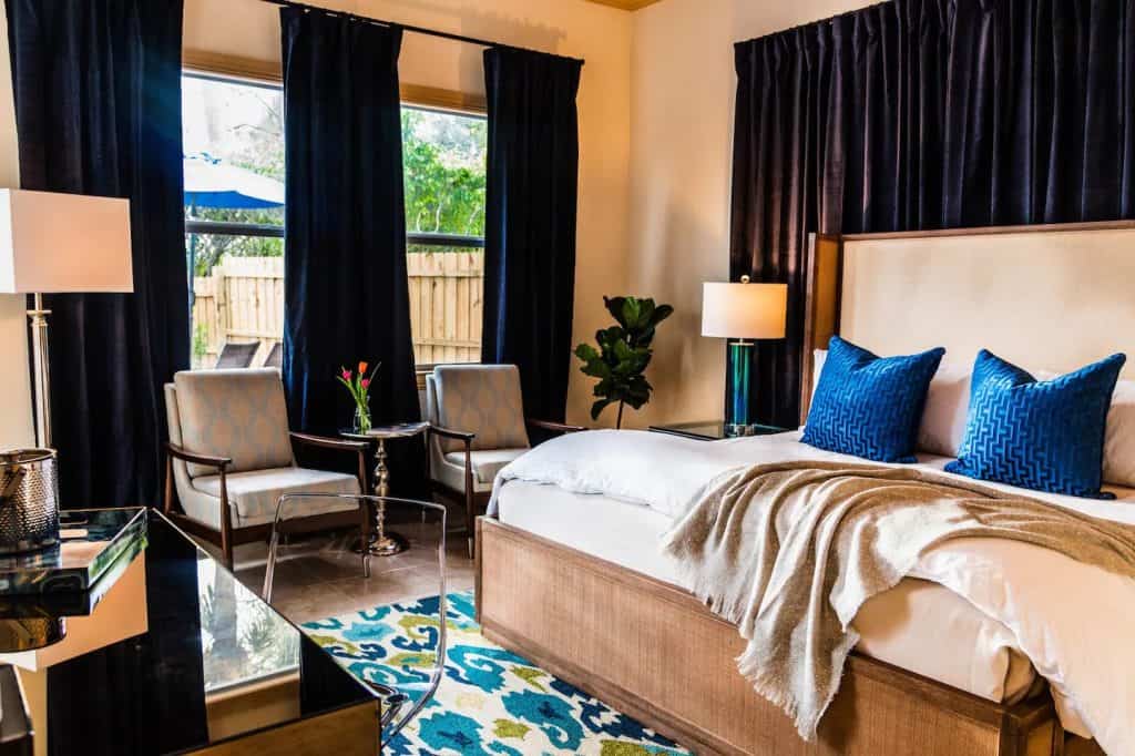 Photo of the Egret Suite Airbnb bedroom and seating area in Naples.