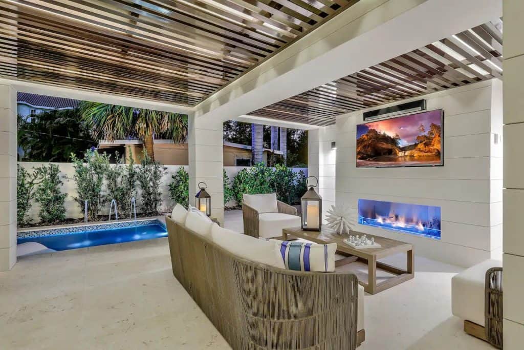 Photo of the lounge area and pool at the Luxe 9th Street Villa Airbnb.