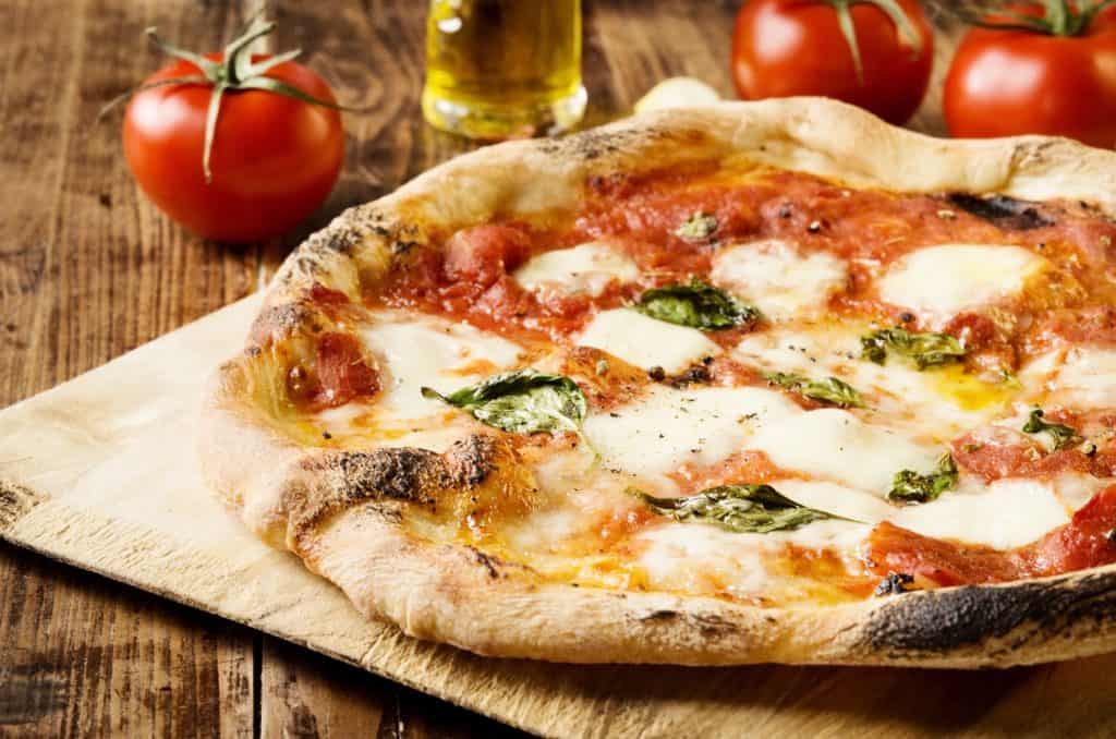 A delicious margherita pizza fresh from the oven from one of the best downtown Tampa restaurants.