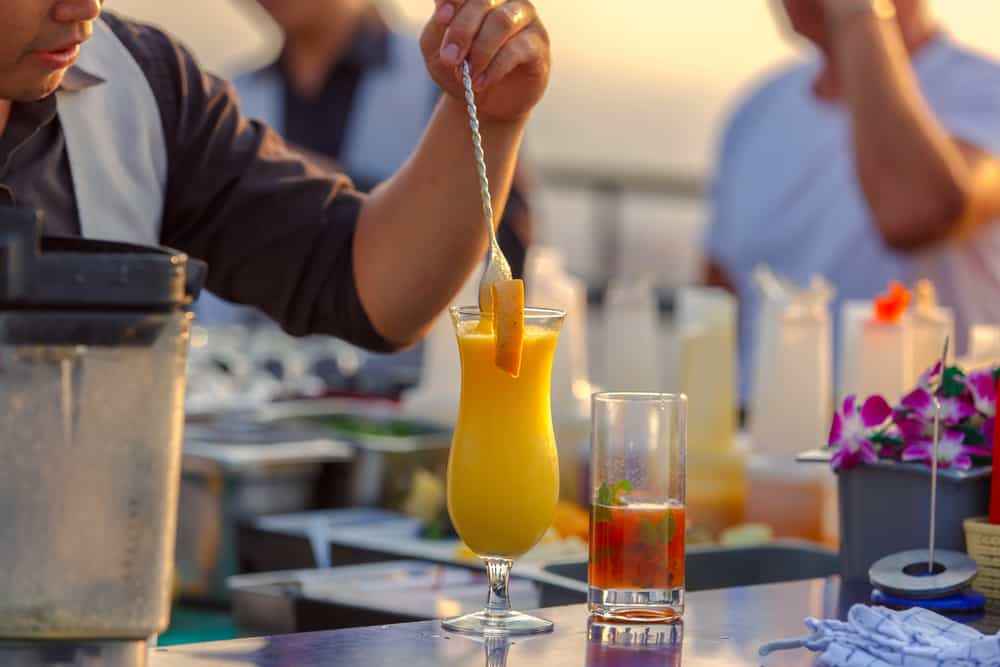 Bartenders making cocktails