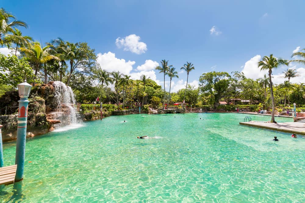 the venetian pool looks like its own little paradise