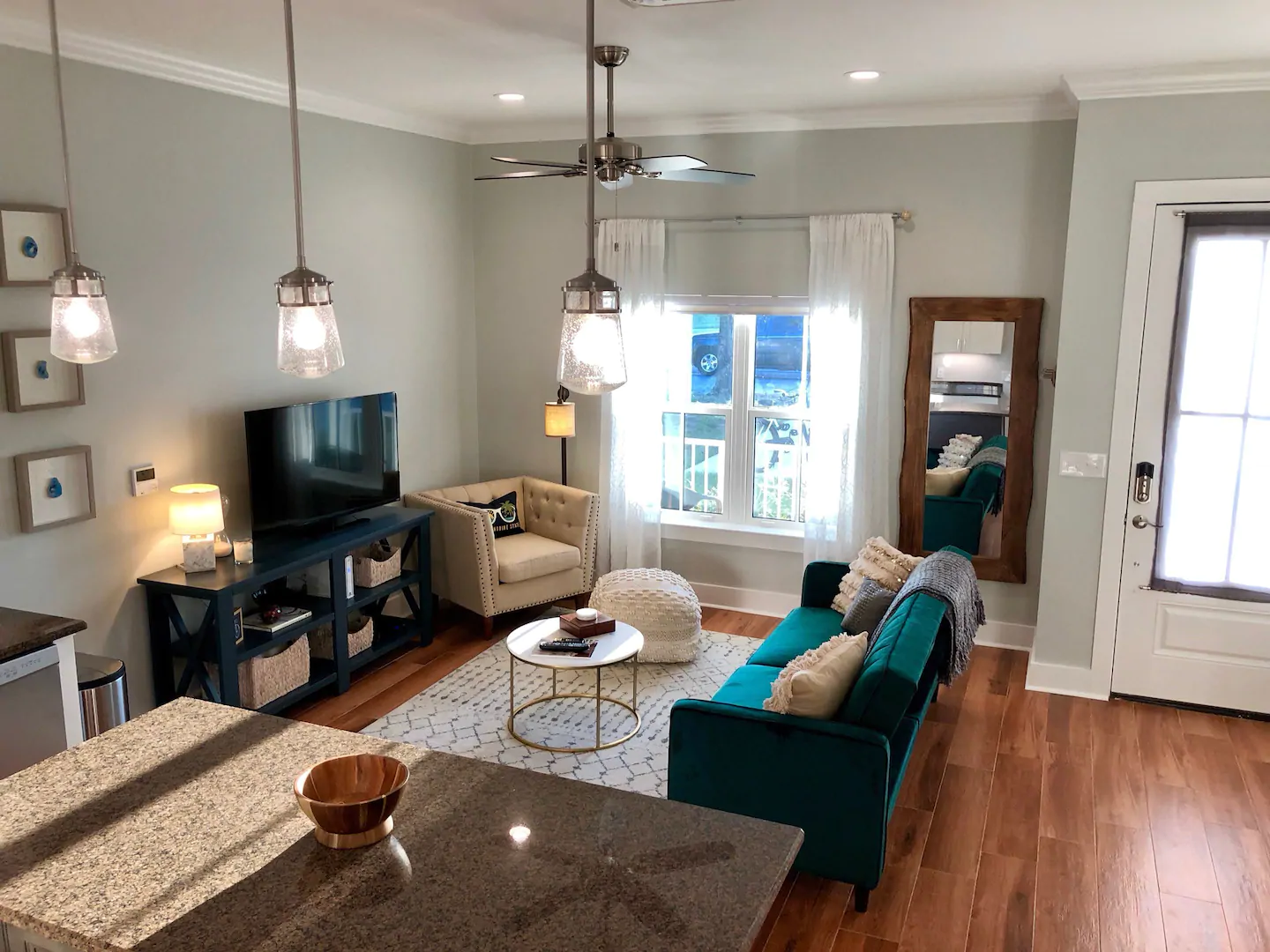 Photo of the living room inside an eco-friendly Airbnb. 