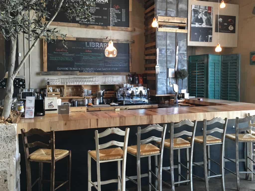 The bar area of a quaint coffee shop in Miami.