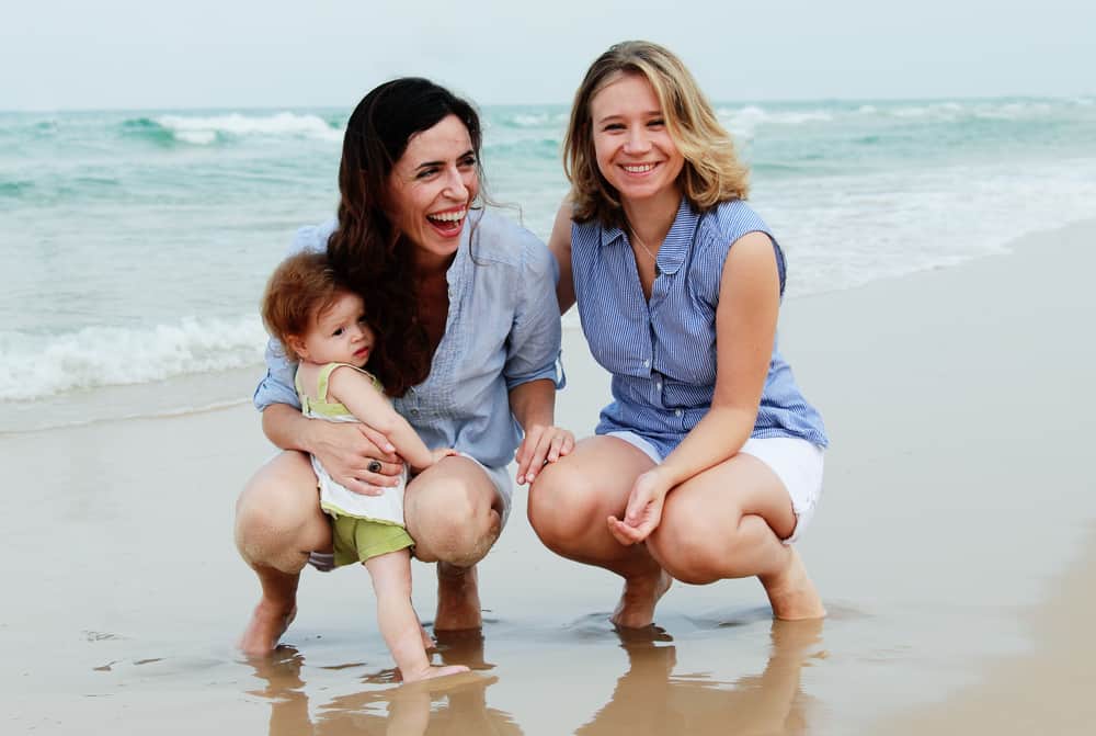 A modern family on the beach