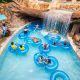 inner tubes in a water park in florida with a waterfall