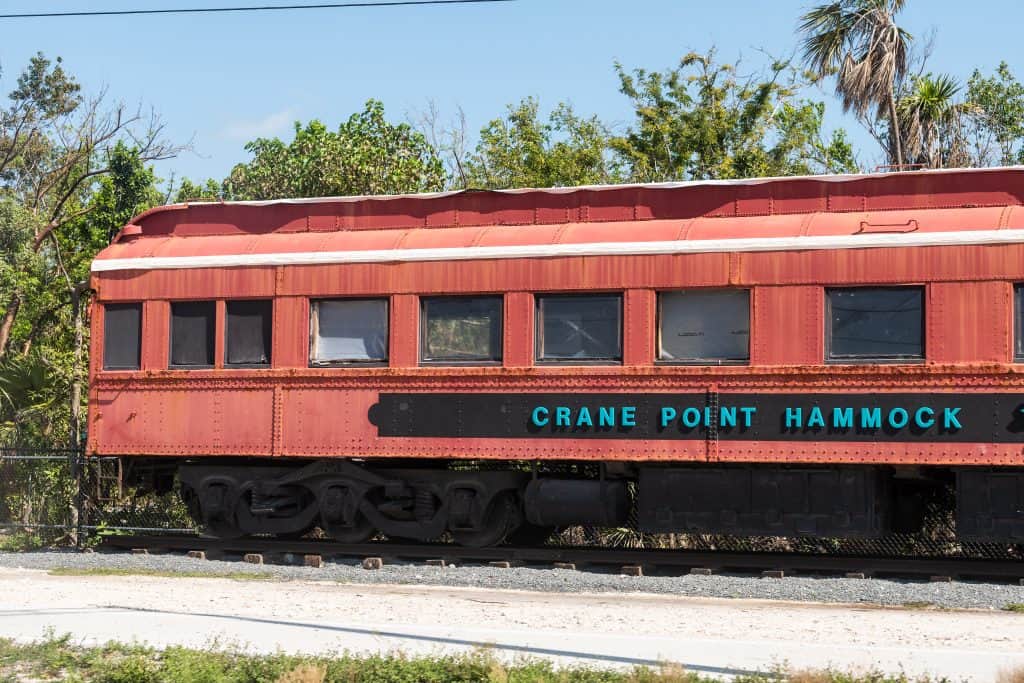 A train sits in the Crane Point Nature Area as part of the museum.
