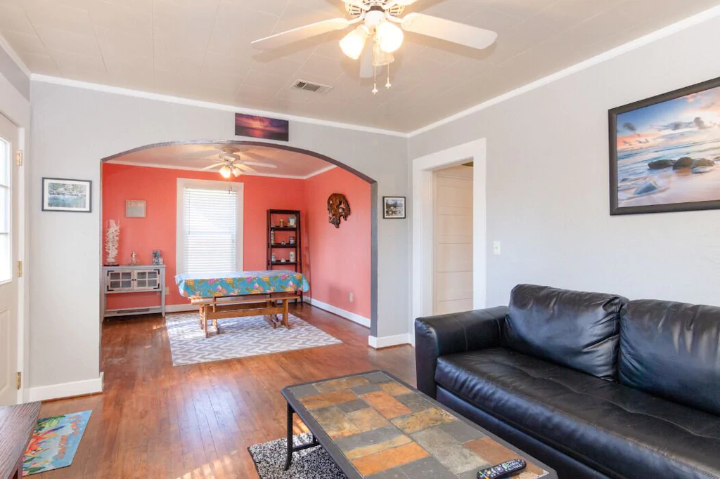 One of the cutest airbnbs in Pensacola is aptly named the Flamingo Pad for it's bright pink walls