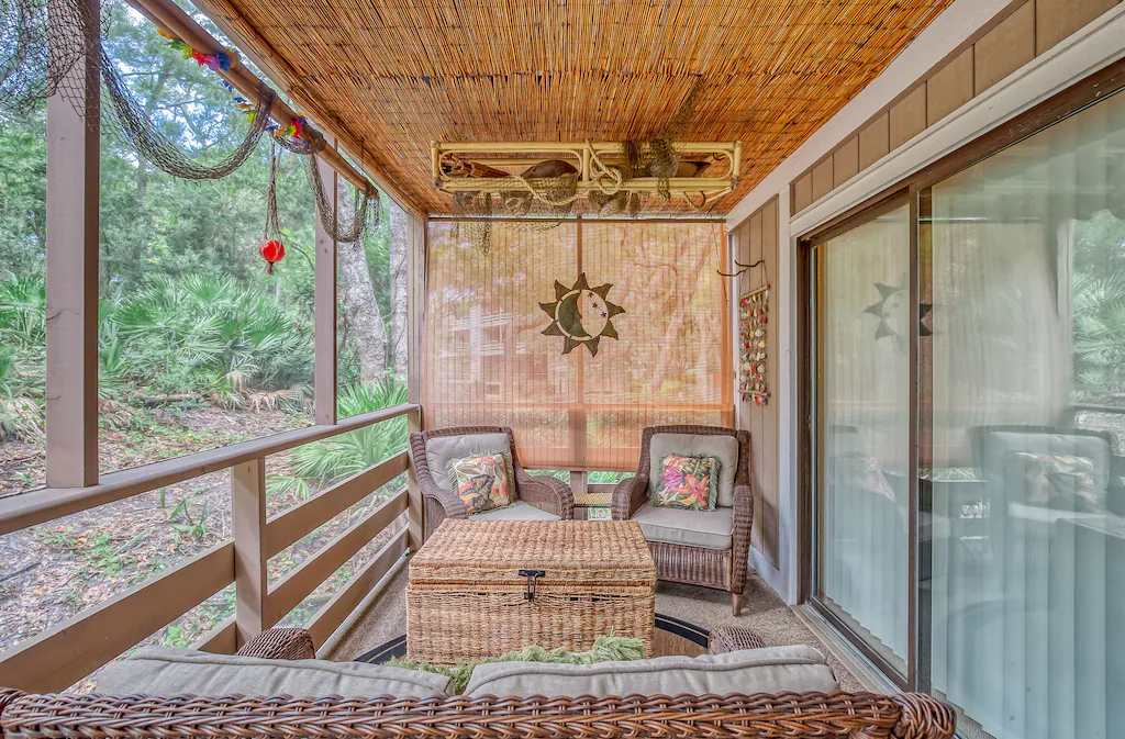 The screened in porch of the Secluded Lanai backs directly into the woods, giving a beautiful view