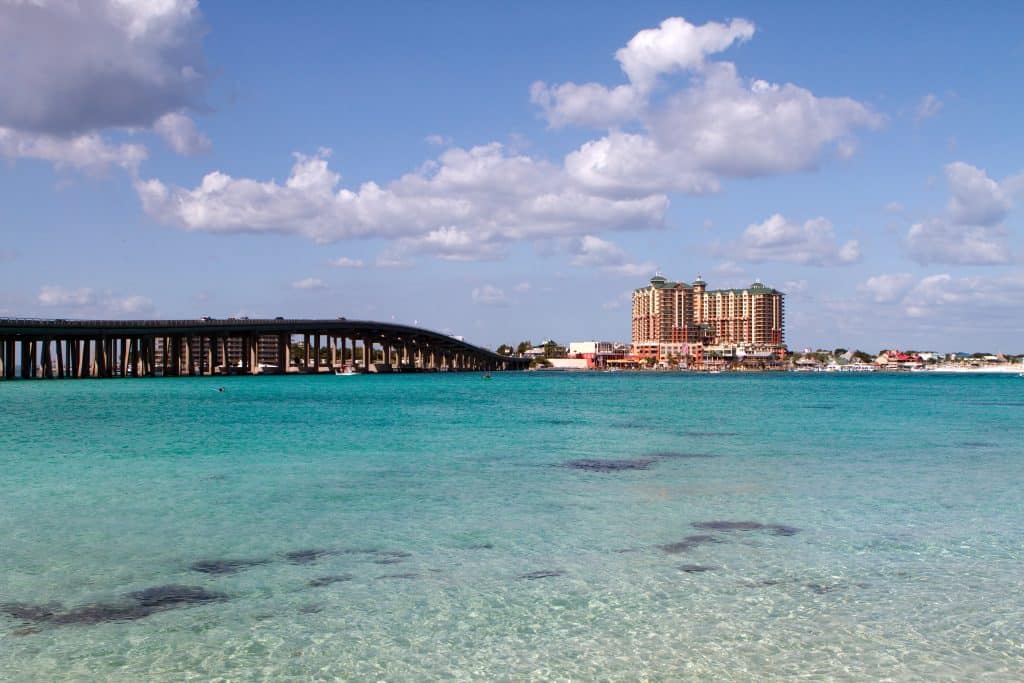 The clear blue-green waters of Crab Island, Florida glitter in the sunlight.