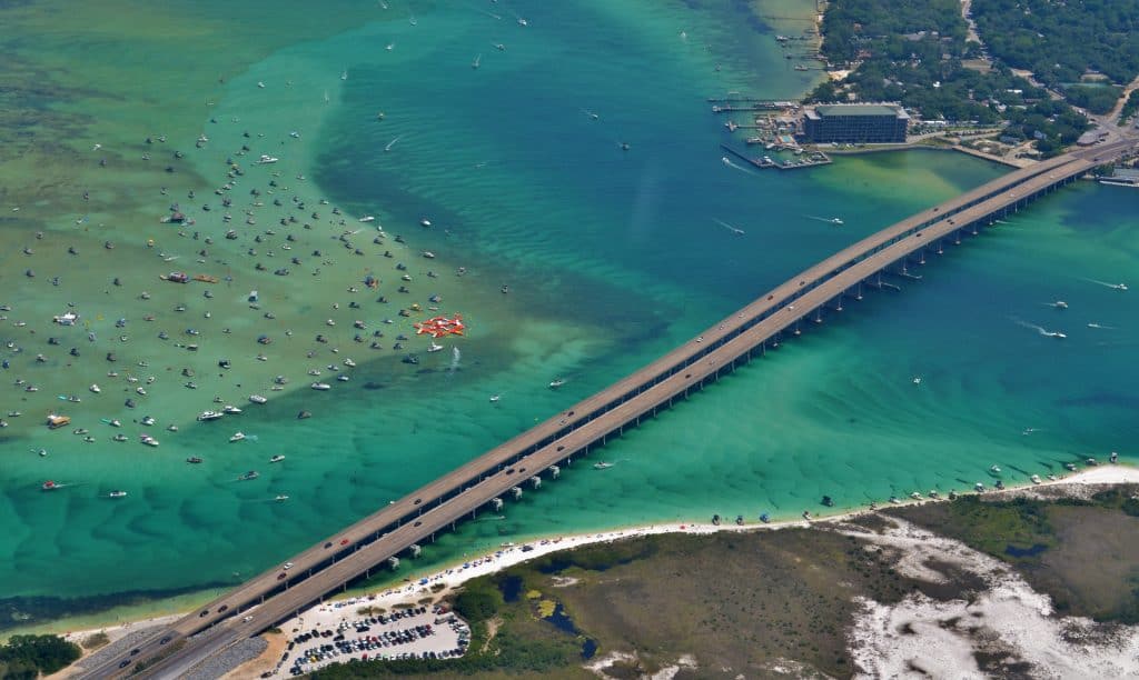 Through this drone image, you can see the boats on Crab Island as well as a floating obstacle course.