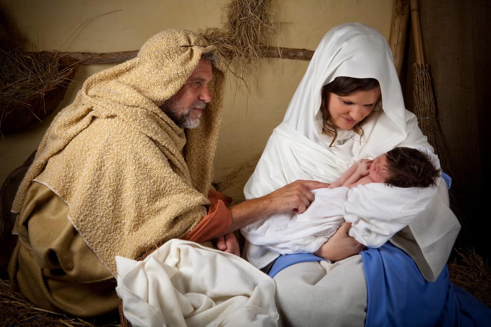 Live reenactment on the nativity scene with Mary, Joseph, and baby Jesus.