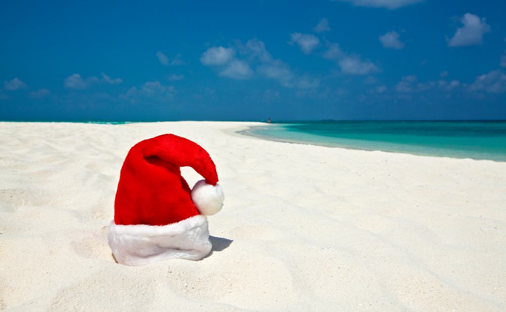 Santa Hat on a white sand beach.