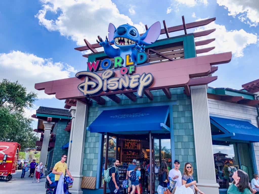 The World of Disney storefront with Stitch overlooking guests at disney springs mall in orlando