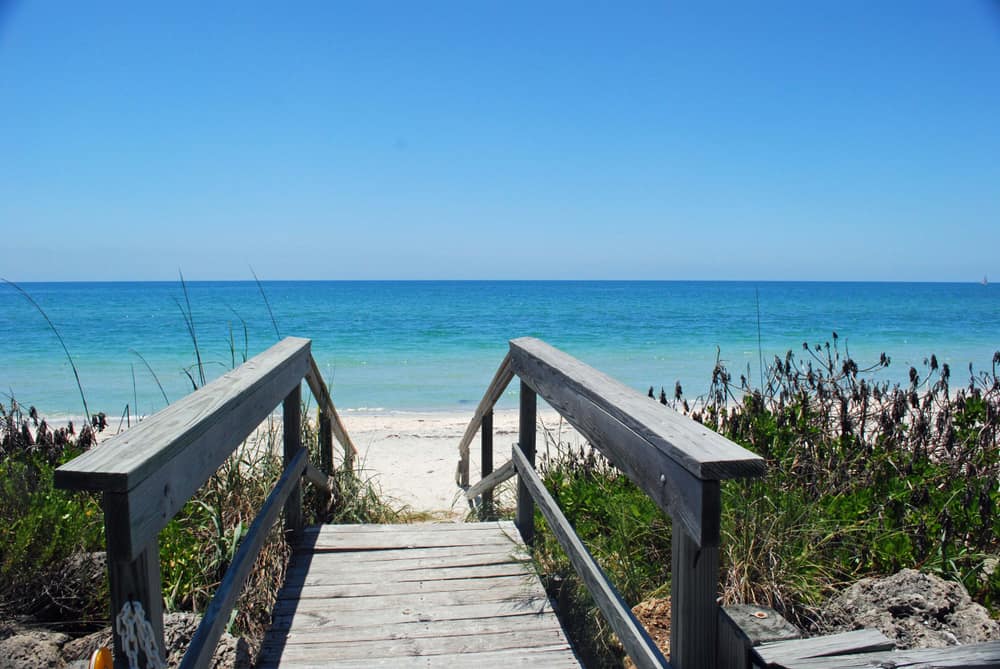 Walkway leading to Casey Key Beach with the gulf in the background.