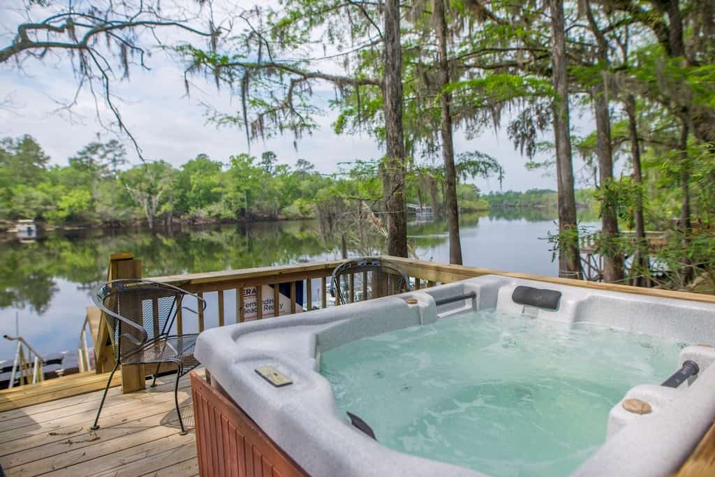 view of the river from the deck and hot tub of the Suwannee River Home