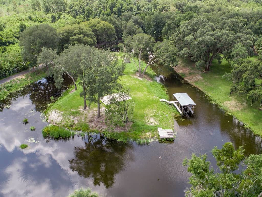 The peninsula you get to stay on at this rental, one of the best glamping spots in Florida! 