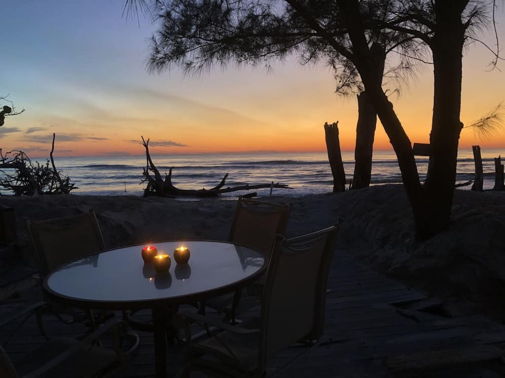 sunset view over the beach from the beachfront cabin, one of the best glamping spots in Florida. 