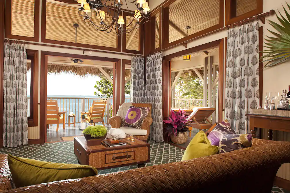 The tiki-hut design and island vibes of the rooms at the Little Palm Island Resort.