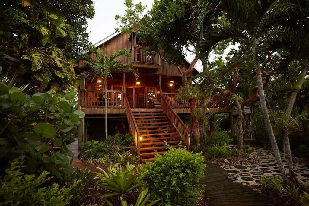 This lush private island treehouse located in the Florida Keys surrounded by lush trees