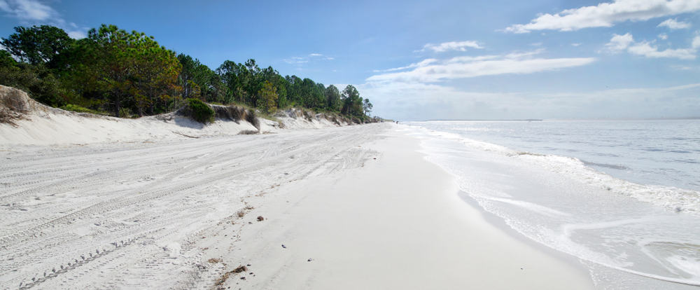 The unspoiled white sand at one of the east coast beaches in Florida 