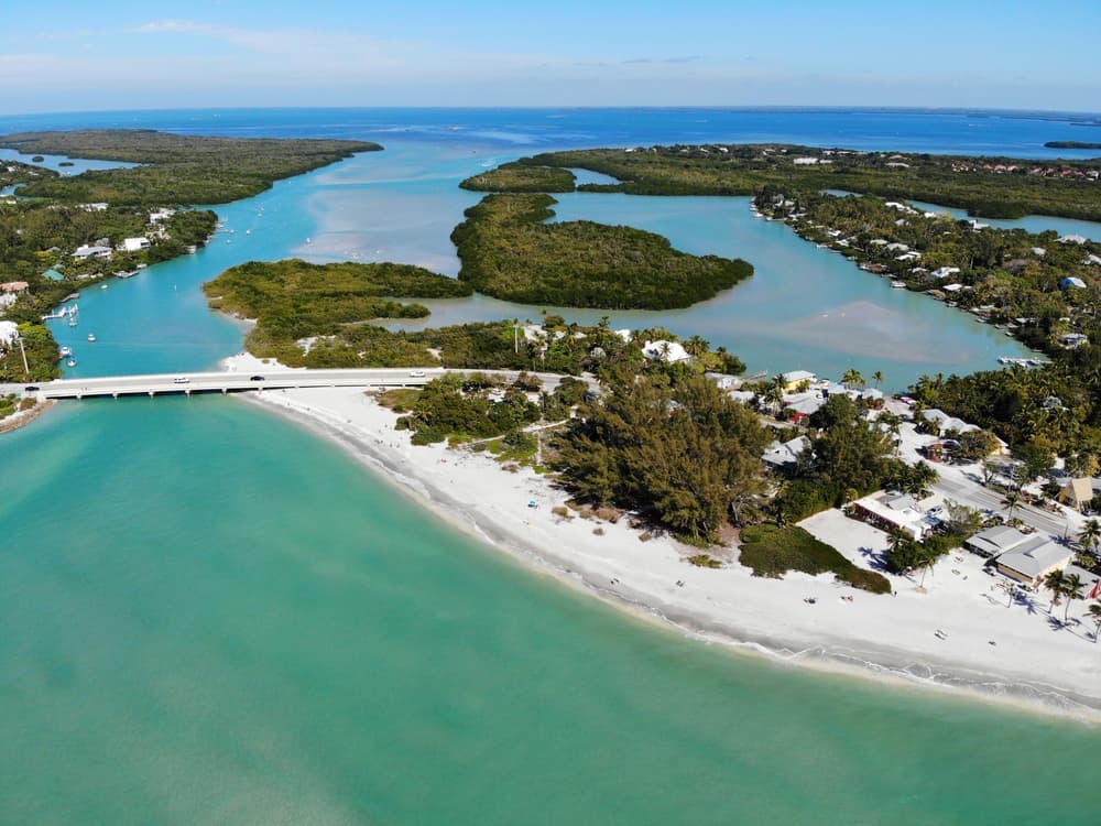 Arial view of Captiva island crystal clear water and white sand at one of the best small beach towns in Florida