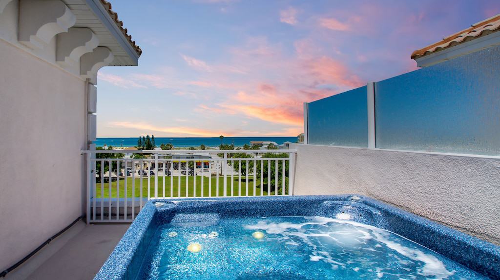View of a beautiful sunset from the rooftop jacuzzi of the first entry of our best airbnbs in Clearwater list. 