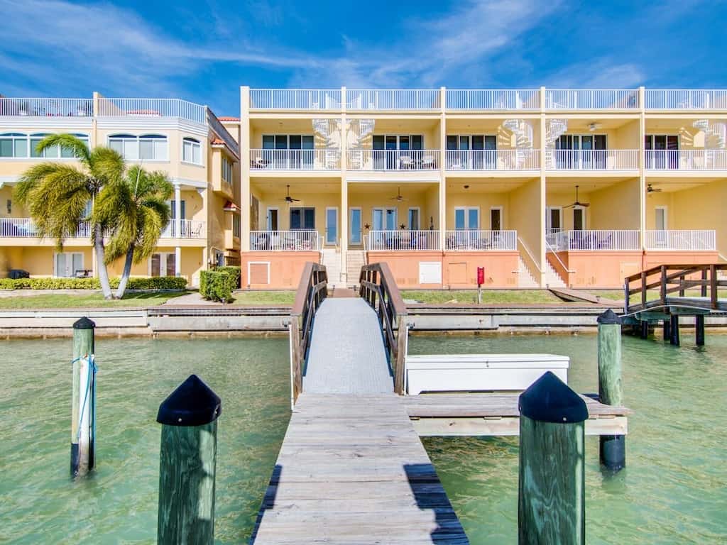 View from the dock towards the yellow roooftop terrace townhouse.