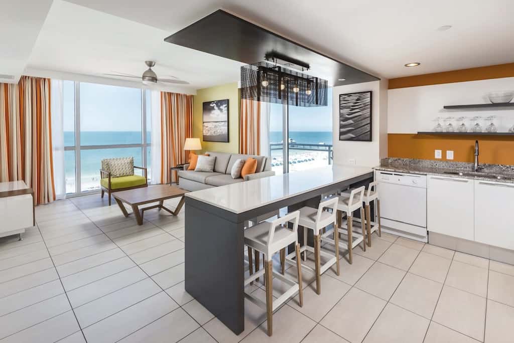 The interior of the sleek modern Wyndham Oceanfront Condo, and its incredible view. 
