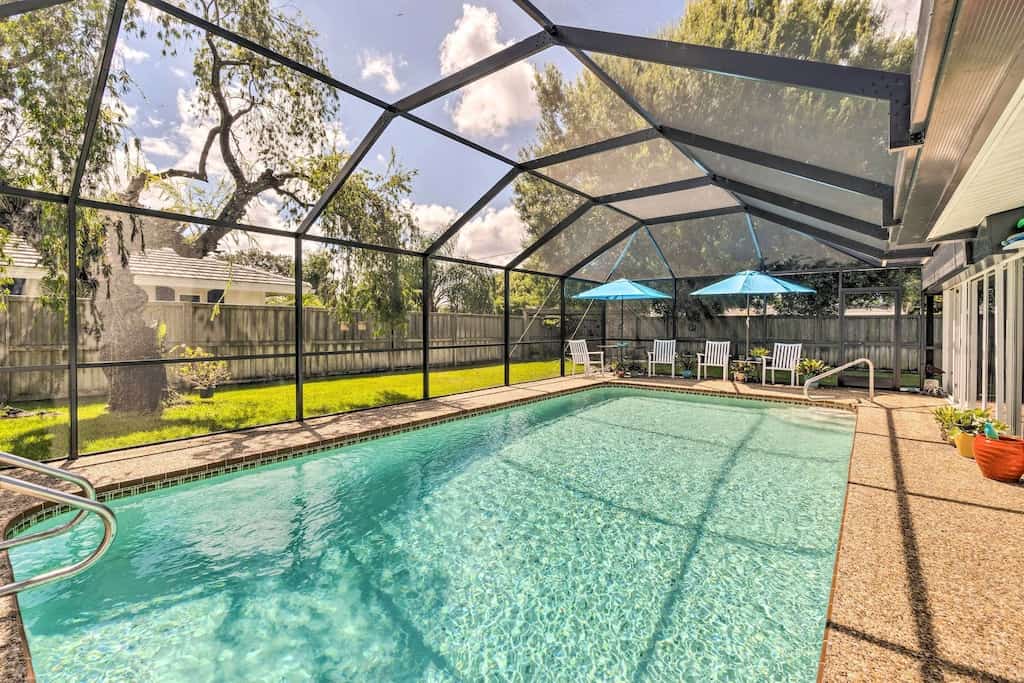 The screened in private pool of the studio property, one of the best airbnbs in Sarasota. 