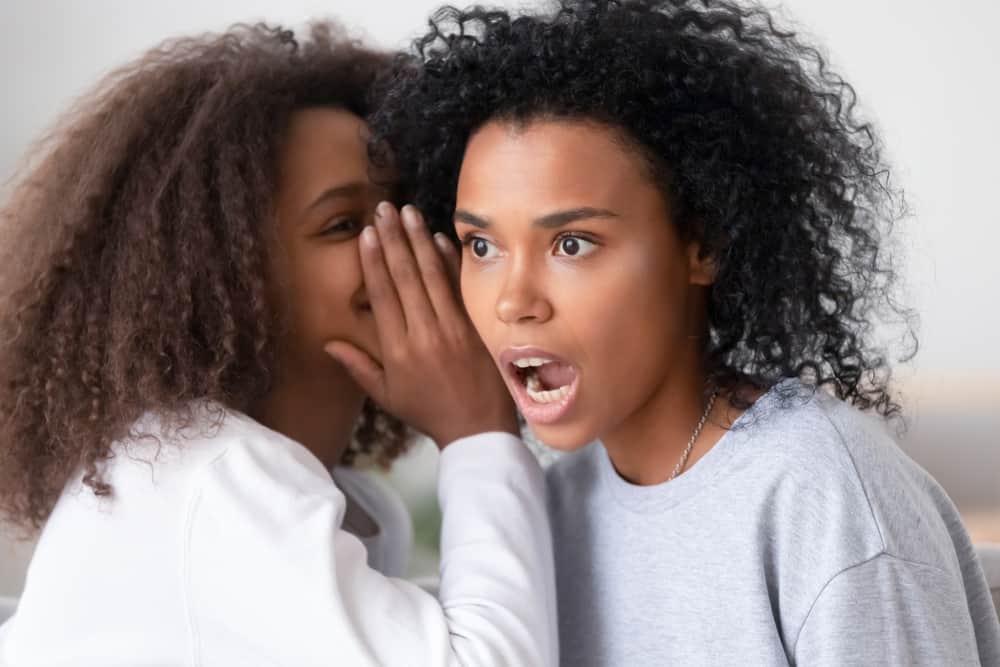 A pair of women demonstrate one of the weird laws in Florida, gossiping. 