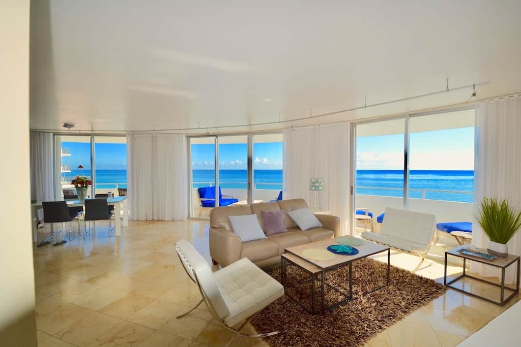 epic ocean view from this VRBO unit is visible through floor to ceiling windows